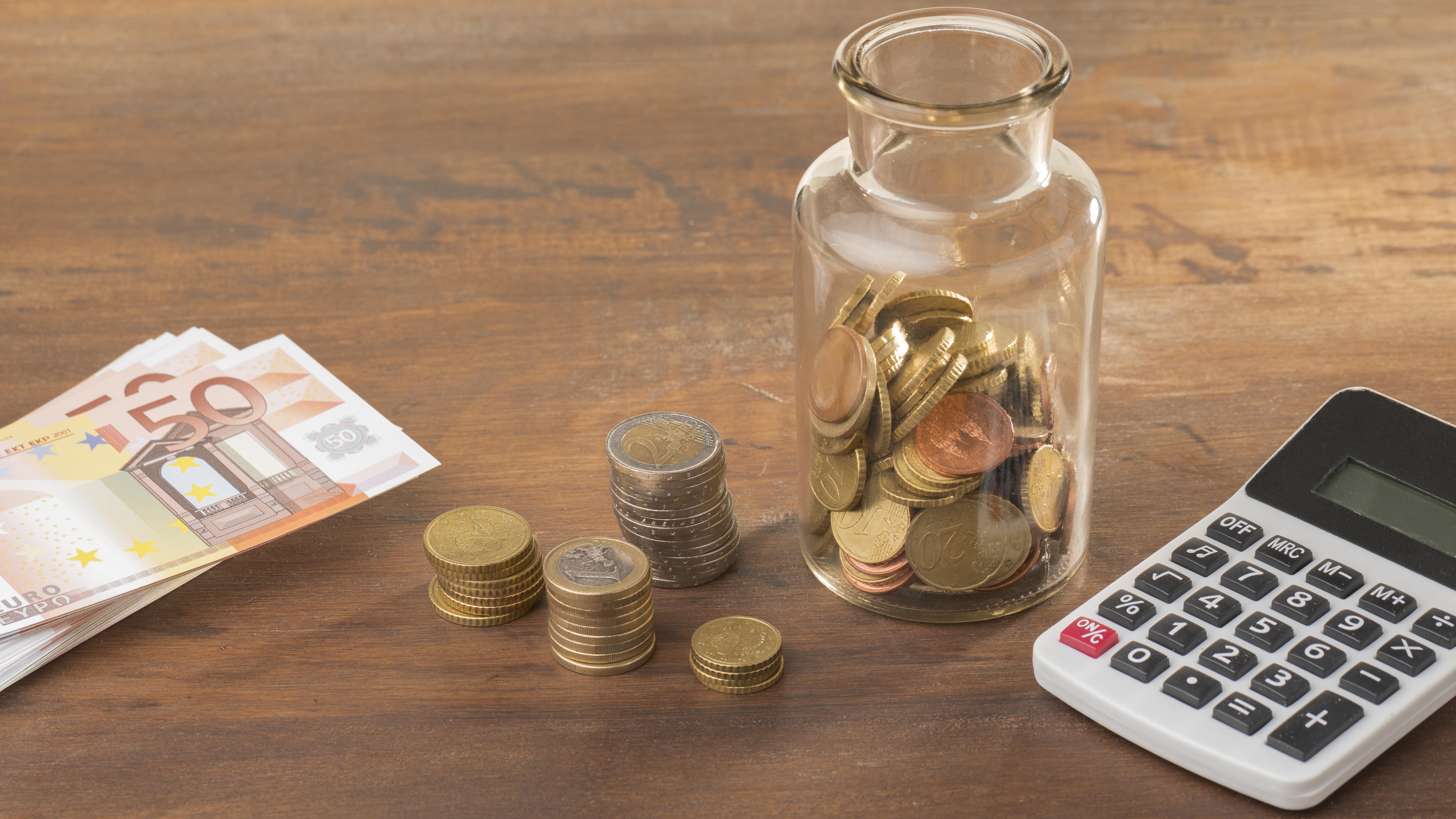 economy savings jar with calculator